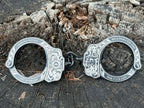 9003- Peerless custom engraved handcuffs finished product