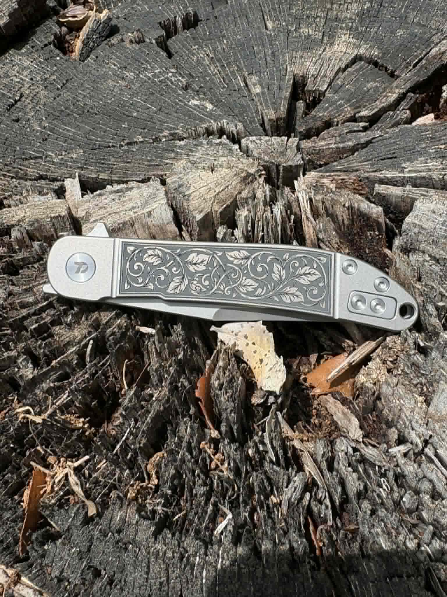 7019- DreamTech Framelock Gray Ti - leaf design