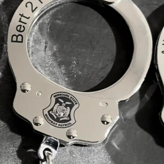 7003- Custom engraved peerless handcuffs
