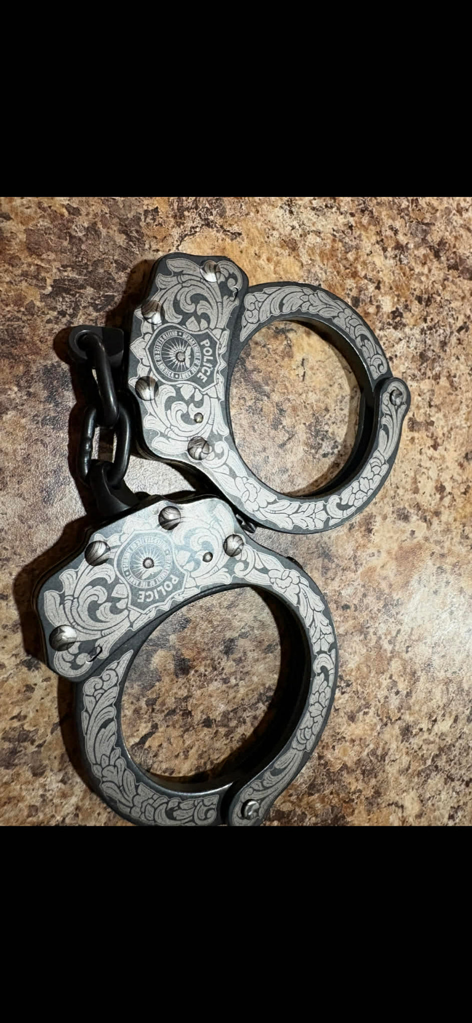 7002- Custom Engraved Peerless handcuffs