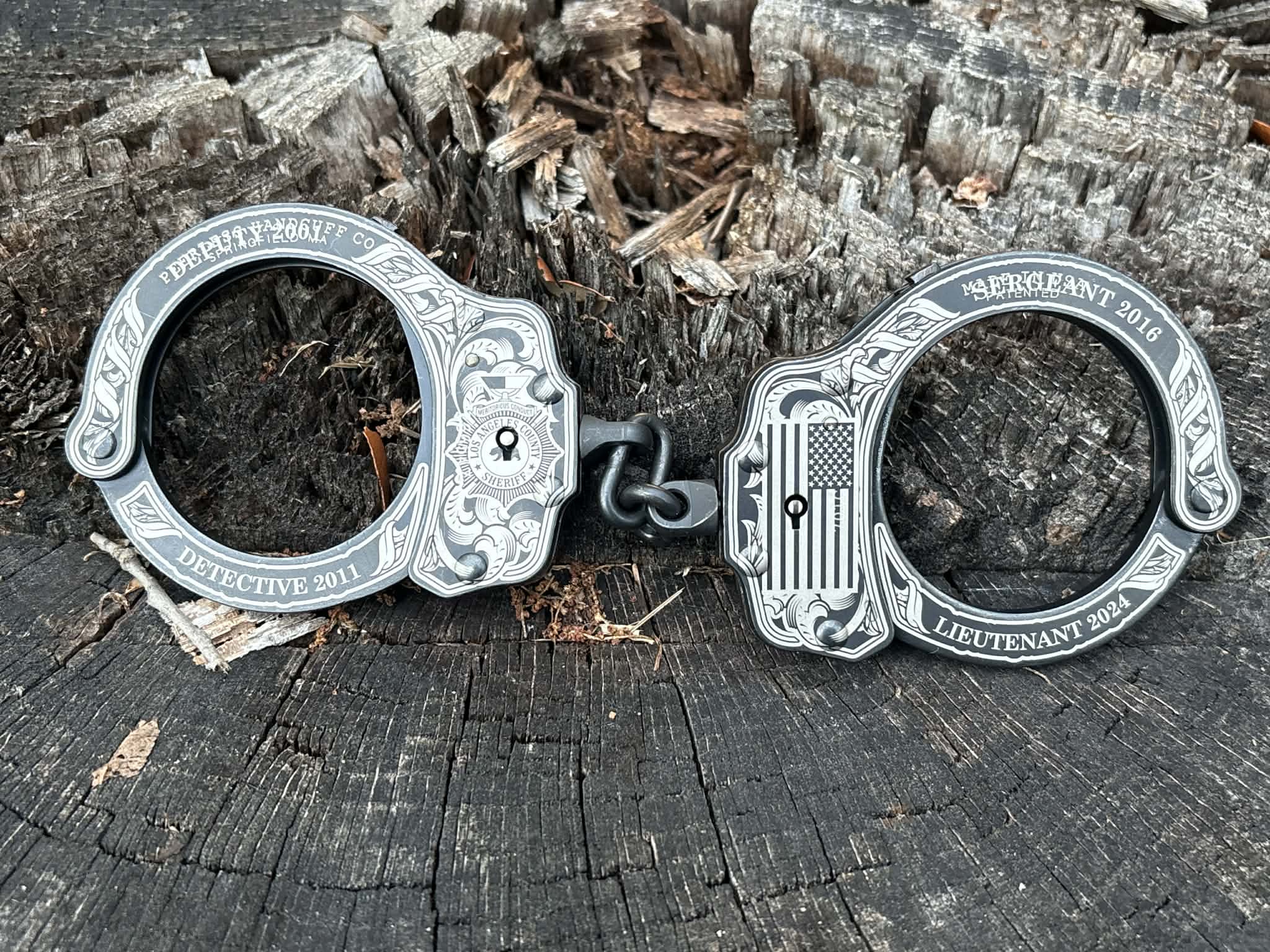 9003- Peerless custom engraved handcuffs finished product