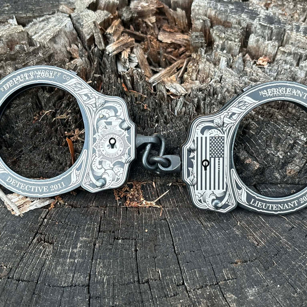 9003- Peerless custom engraved handcuffs finished product