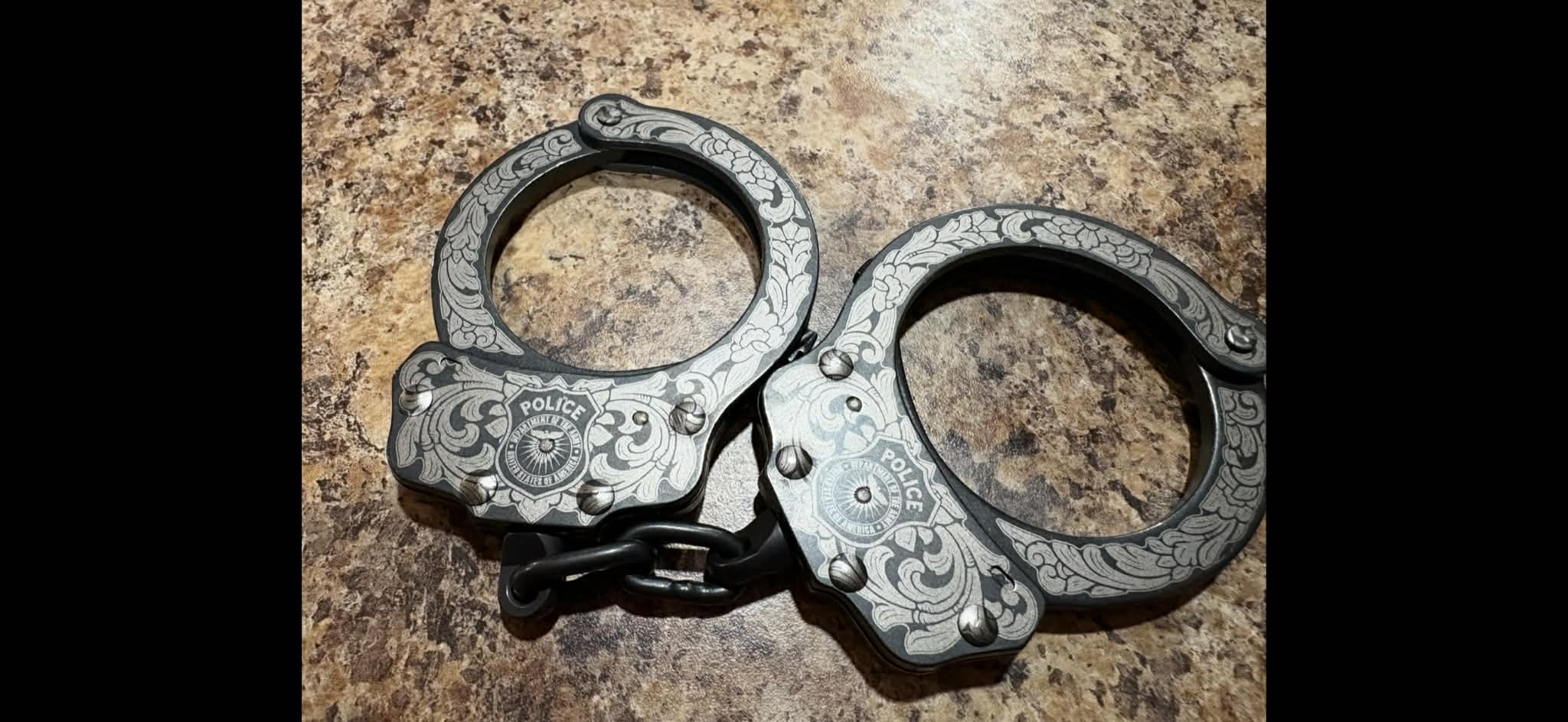 7002- Custom Engraved Peerless handcuffs