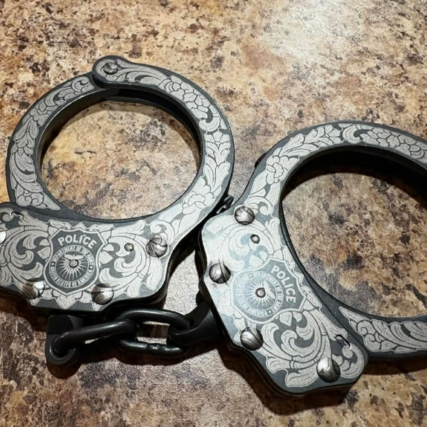 7002- Custom Engraved Peerless handcuffs