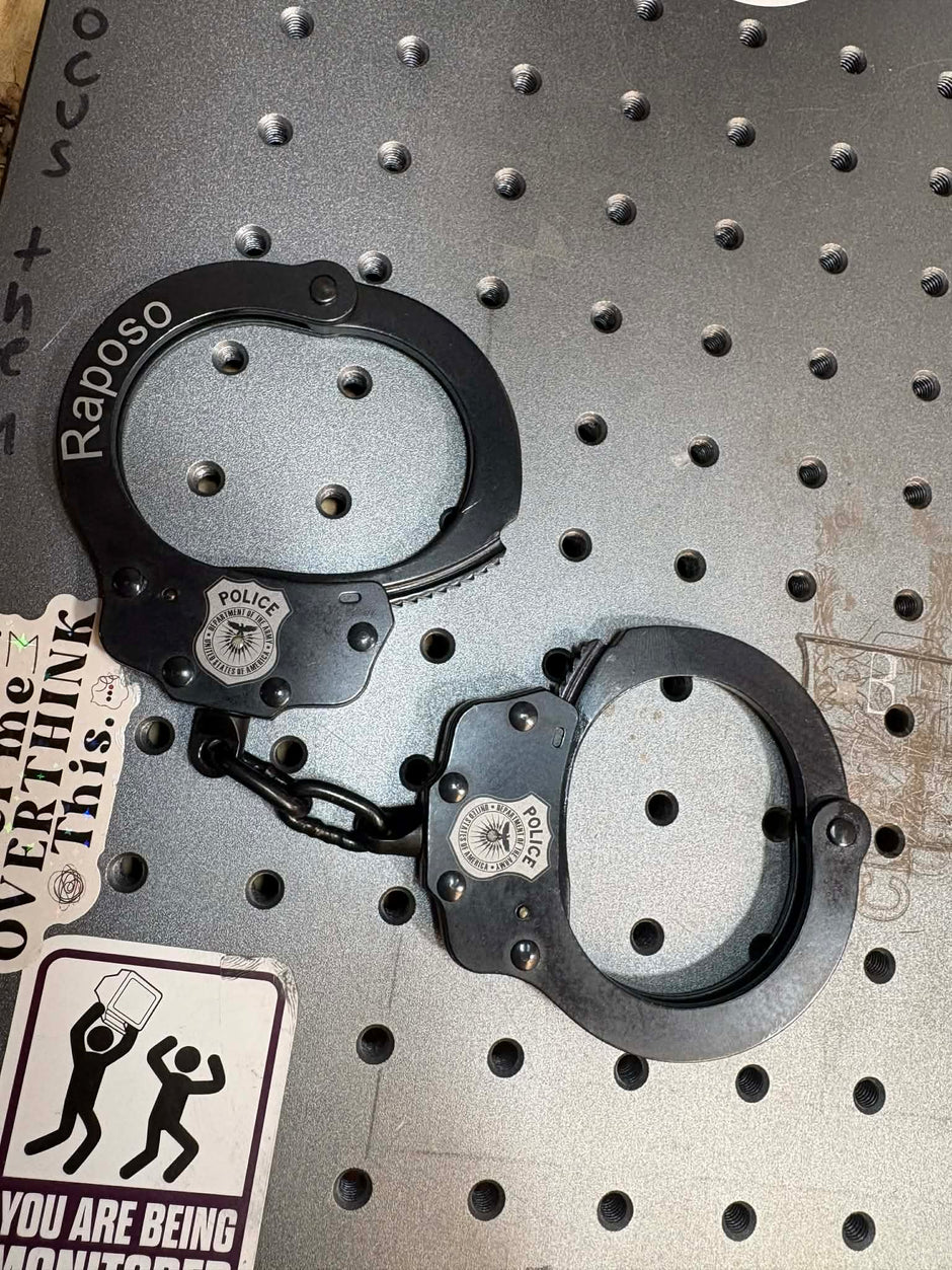 7003- Custom engraved peerless handcuffs