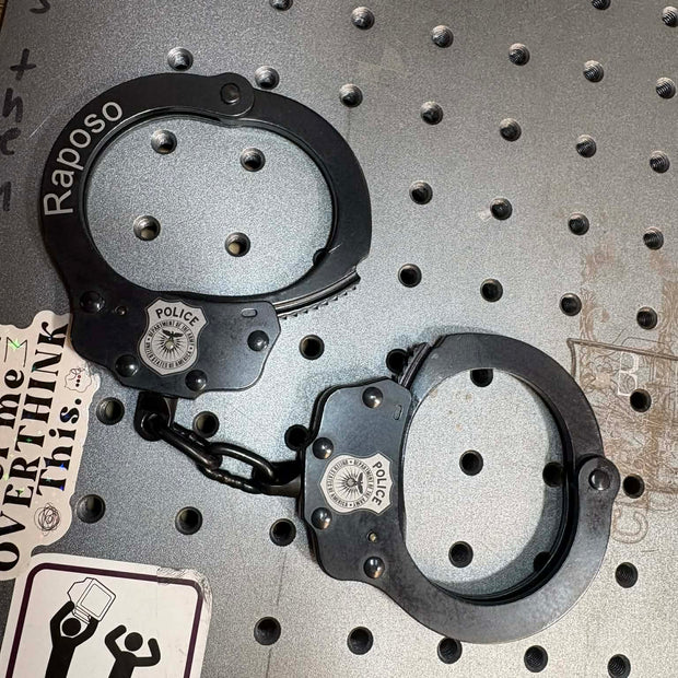 7003- Custom engraved peerless handcuffs